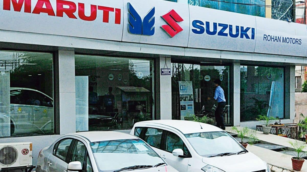 Maruti Suzuki small cars on display at Indian dealership