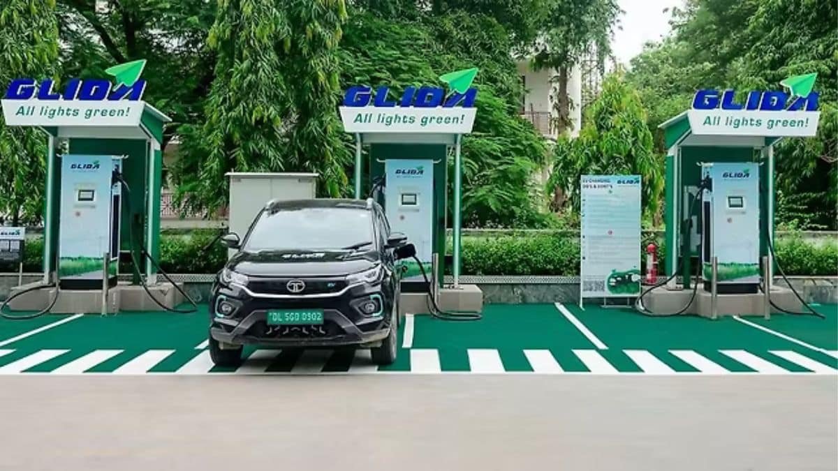 Electric vehicle charging at a public fast charging station in India