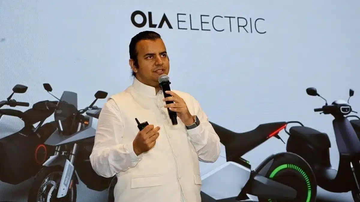 Ola Electric electric scooters at manufacturing facility highlighting automation and operational restructuring in India