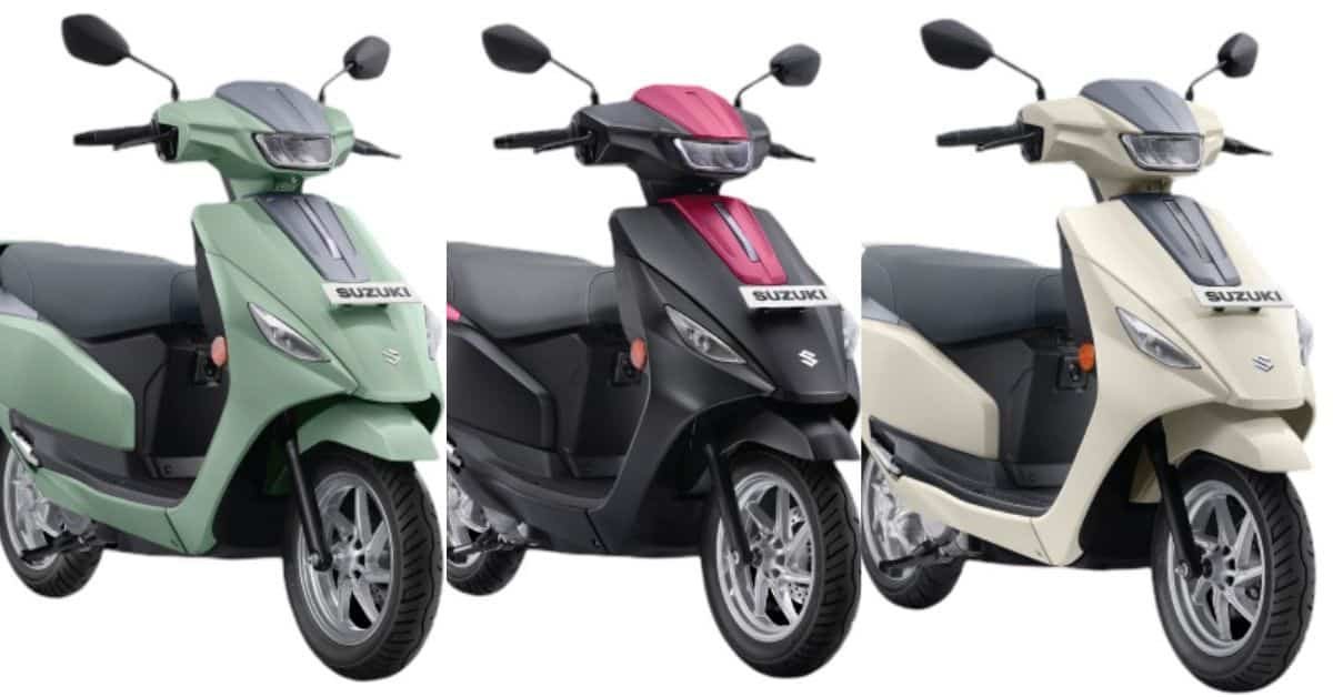 Suzuki e-Access electric scooter parked with city backdrop at launch