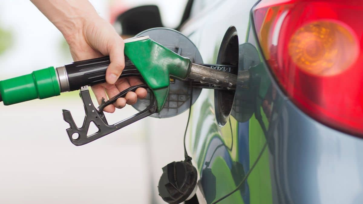 Petrol car parked in an Indian city showing ownership decision for low-usage drivers