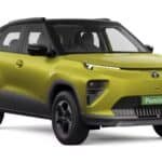 Tata Punch EV compact electric SUV driving in city showing modern design, charging port and practical urban usability in India