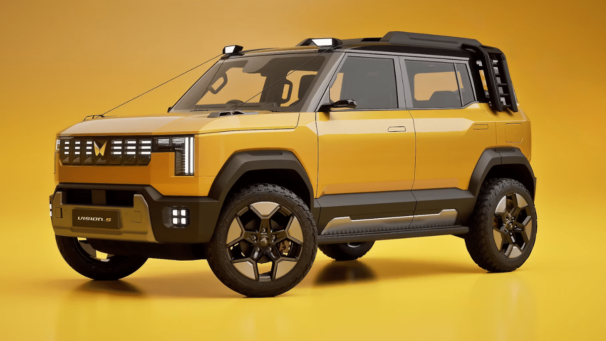 Mahindra Vision S compact SUV prototype spied testing in India with rugged boxy design and camouflaged exterior