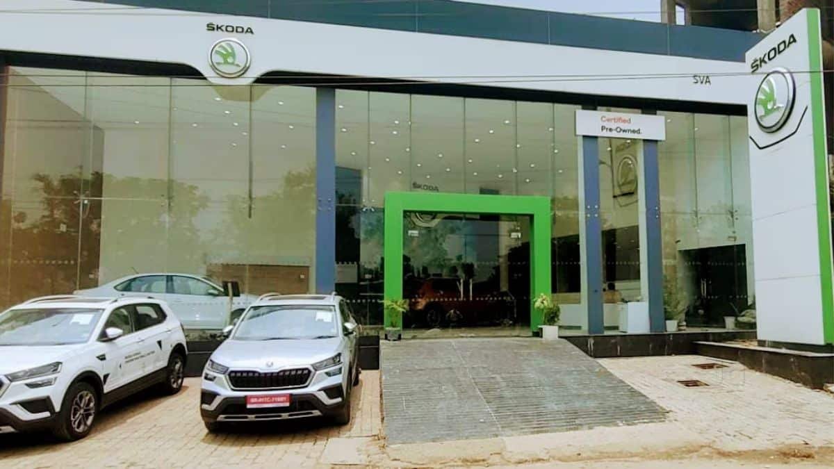 Skoda Auto India showroom in Shillong displaying Skoda vehicles inside a modern dealership