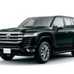 Toyota Land Cruiser LC300 luxury SUV driving on highway showing strong road presence, premium design and off-road capability