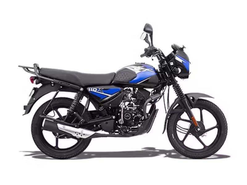 Bajaj CT 110X on an unpaved rural road showing its rugged build