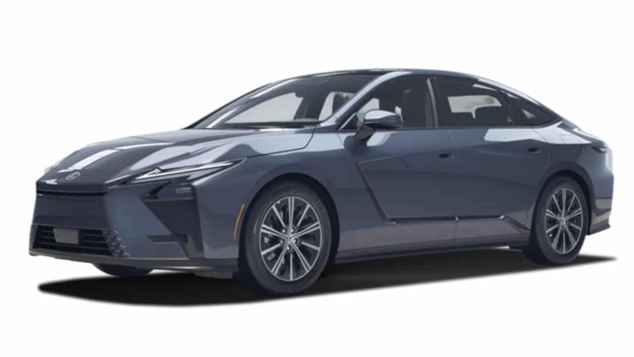 New-generation Lexus ES 350h hybrid sedan parked outdoors, shown from the front three-quarter angle, showcasing its Z-shaped LED headlamps.