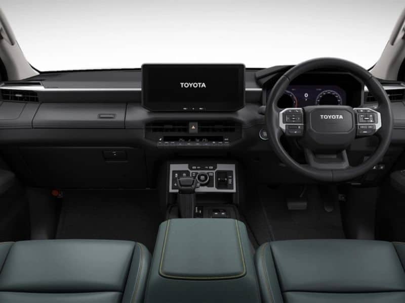 inch display dashboard Toyota Hilux 2026 dashboard showing dual 12.3-inch digital instrument cluster and touchscreen infotainment display