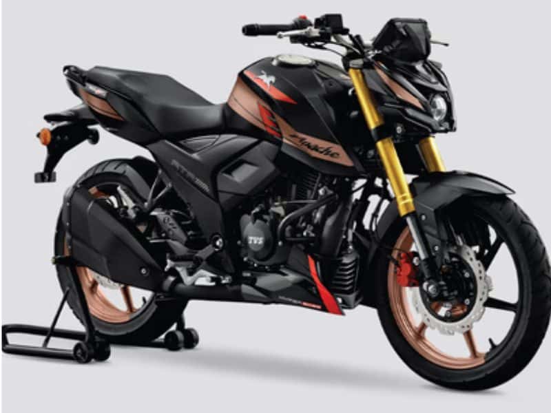TVS Apache RTR 160 4V motorcycle leaned into a corner on a city street