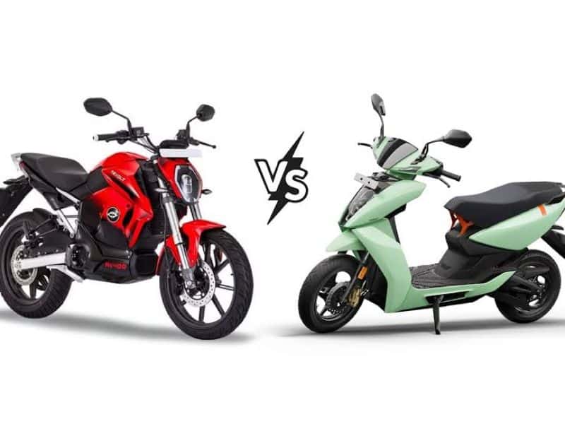 An electric motorcycle parked beside an electric scooter for size and style comparison