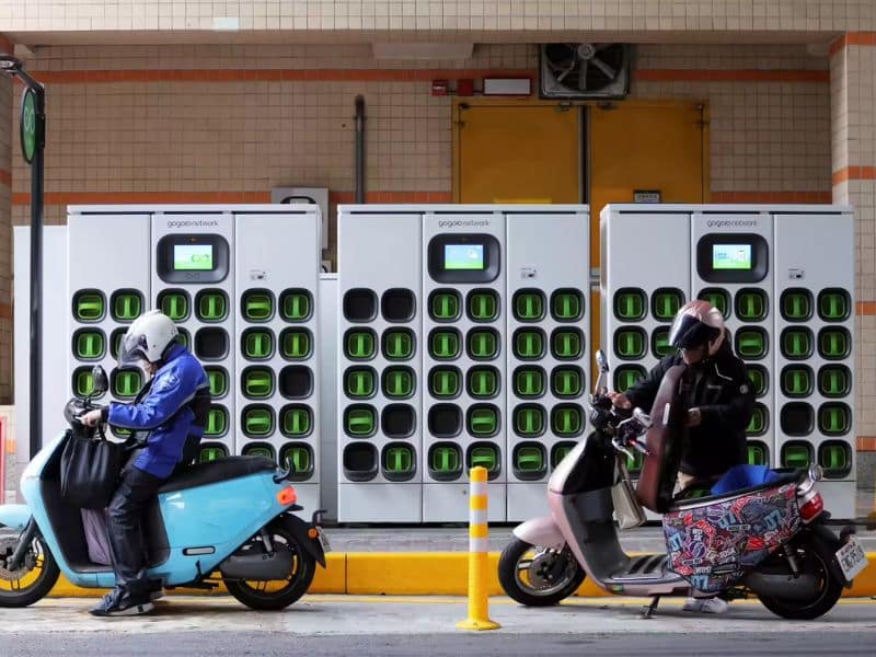 Electric scooter at a battery swapping station in an Indian city