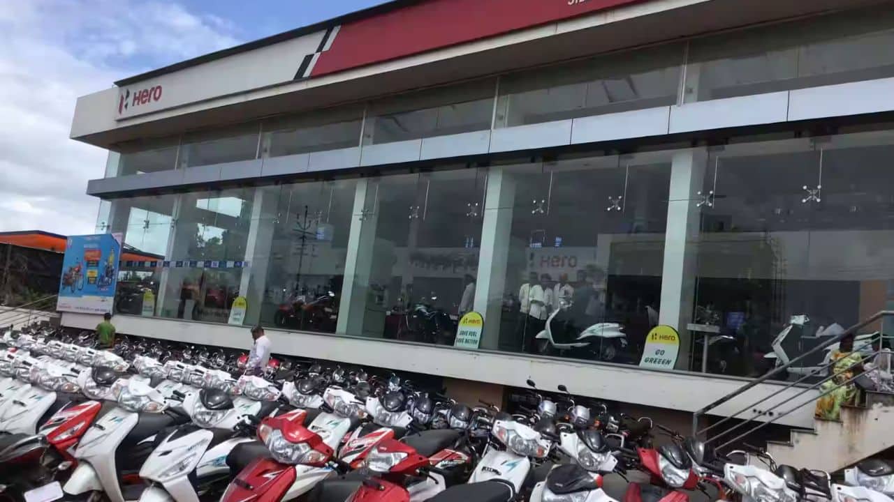Hero MotoCorp motorcycles lined up at an Indian dealership showroom, representing the company's July 2026 sales performance.