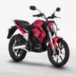 Revolt RV400 and Ultraviolette F77 electric motorcycles parked side by side, representing India's EV motorcycle segment.