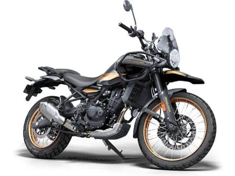 Royal Enfield Himalayan 450 adventure motorcycle with rider seated showing tall seat height