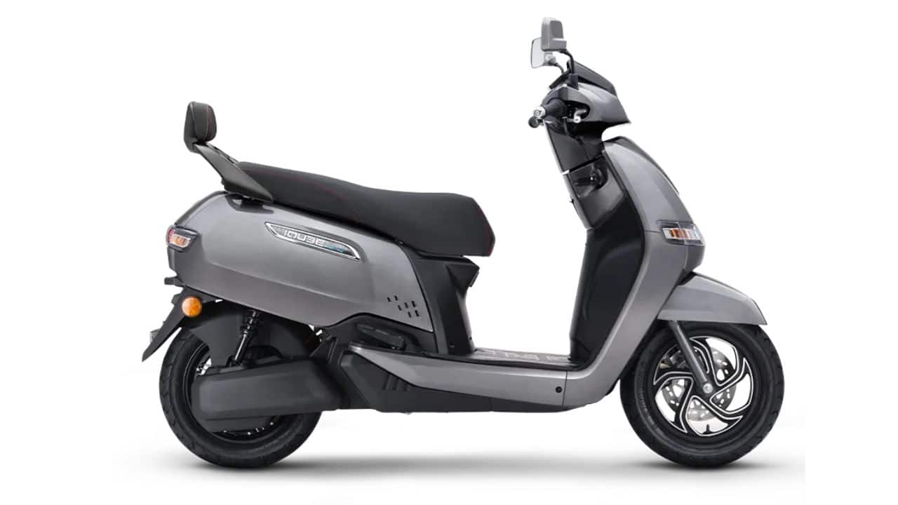 TVS iQube electric scooter parked at an Indian dealership, India's top-selling electric scooter in July 2026.