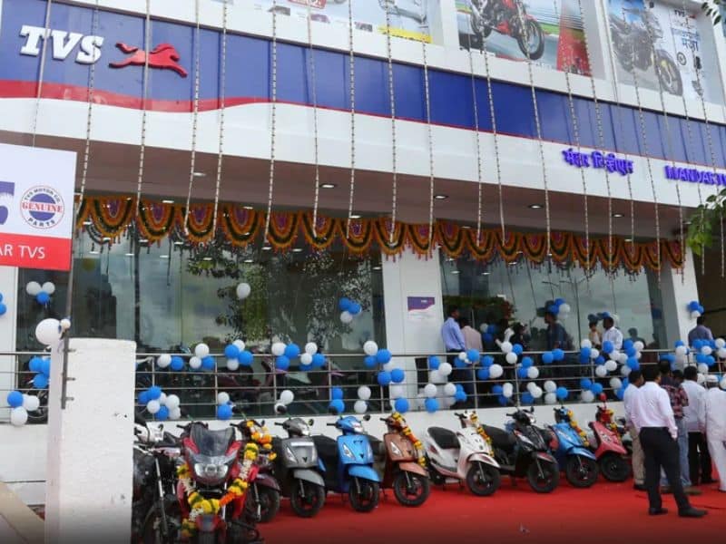Two-wheelers on display at a TVS showroom in India, a brand that raised prices rather than offering discounts in August 2026.
