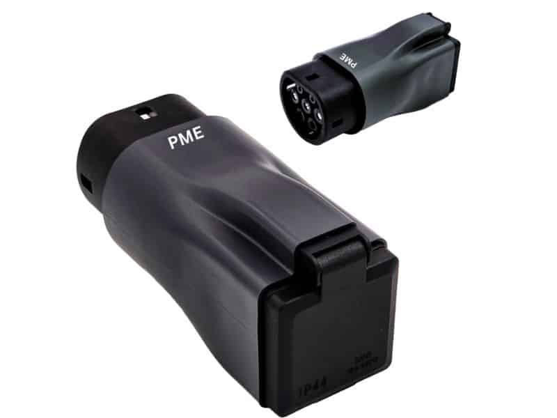 Tata Sierra EV charging port fitted with a V2L adapter powering an external device