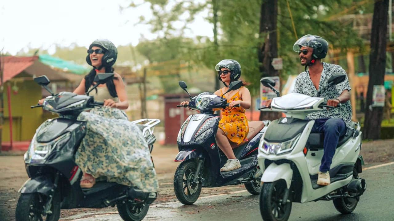 Scooter rider navigating a street in a Tier-2 Indian town, reflecting rising two-wheeler demand outside major metros.